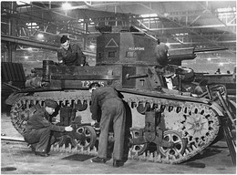 Top: M2A3 in annual Army Day Parade, Washington, 1939. Bottom: Fitters assembling an M2A4 light tank at a British ordnance depot.