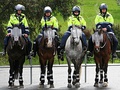 Antidisturbios de la policía montada de Australia.