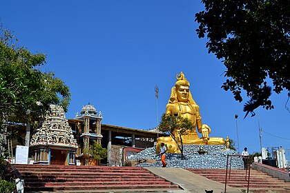 A row of gopurams (towers) in the Srirangam Ranganathaswmy temple, a typical South Indian Vaishnavate temple complex in Srirangam, Tamil Nadu