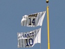 Retired numbers for Ernie Banks and Ron Santo on the left field foulpole and for Billy Williams and Ryne Sandberg on the right field foulpole. Since May 3, 2009, the number 31 also flies on both foul poles, to honor Ferguson Jenkins (left field) and Greg Maddux (right field).