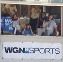 Singing "Take Me Out to the Ball Game" during seventh-inning stretch