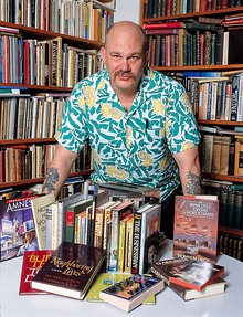 Disch with his books in 1988