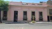 Façade of a typical "Casa Chorizo" house with different ornaments and colors in Buenos Aires (Argentine)