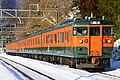 A 115 series EMU between Gokan Station and Kamimoku Station in February 2017