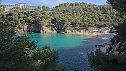 The beach (right) and parador (left)