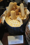 Wide, soft breadsticks in a basket
