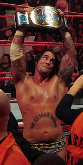 Punk como Campeón Mundial en Parejas en 2008.