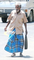 A Malayalee man from Kerala wearing a dhoti.