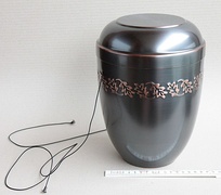 (Germany) A cinerary urn. The laces are used to lower the urn into the ground