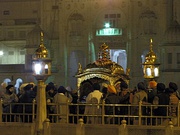 Left: A palanquin being prepared for the daily sukhasan ritual to carry the scripture to a bedroom; Right: The palanquin carrying the Guru Granth Sahib to the sanctum at dawn (prakash).