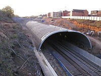 Construction of the tunnel, which was meant to enable the construction of a new supermarket over the railway line, pictured three months before the collapse. While the council blocked the store, the decision was overturned and construction began.