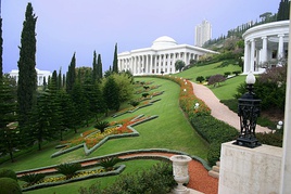 Aerial photo and a partial view of international administrative buildings on the Arc at the Baháʼí World Centre on Mt. Carmel in Haifa