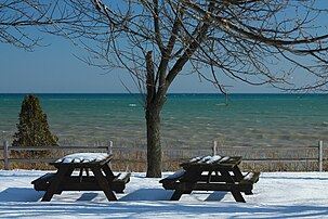Lakeside picnic tables in February