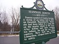 Modern roadside historical marker in Boscawen, New Hampshire, about the 1697 scalping incident involving Hannah Duston