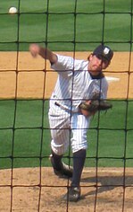 Pat Venditte pitching right-handed for the Staten Island Yankees in 2008 and left-handed for the Oakland Athletics in 2015