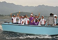 Shera, the mascot of the Commonwealth Games Delhi 2010 takes a ride on Dal Lake