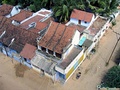 The view of the houses, as seen directly under your feet from the Baith-As-Salaam masjid minera.