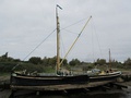 Edith May sailing Barge at Lower Halstow at low tide.