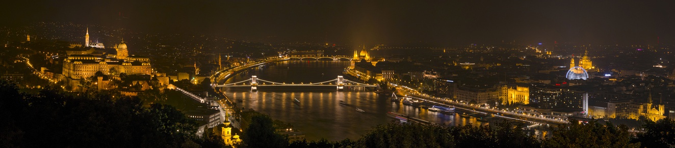  Night panorama from Gellért Hill with the illuminated Buda Castle, Matthias Church, Danube Chain Bridge, Parliament, Hungarian Academy of Sciences, St. Stephen's Basilica, Budapest Eye, and Vigadó Concert Hall