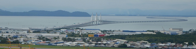  A panoramic view of Batu Maung, within the South-West District. The Bayan Lepas Free Industrial Zone is in the foreground, whilst the Second Penang Bridge can be seen in the horizon.