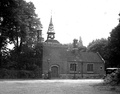 The station building in 1957, the clock and entrance porch removed