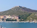 View of the town and, upon the hill, the fortress named Forte Filippo