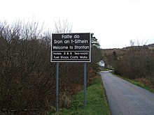 Seña de bienvenida en Estroncia