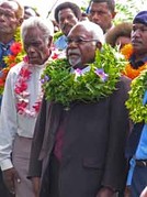 The Lord Tweedsmuir (left) was Governor General of Canada from 1935 to 1940;Sir Paulias Matane (right) was Governor-General of Papua New Guinea from 2004 to 2010