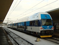 Clockwise from top left: A Metra service of double-decker cars hauled by an F40PH in Chicago A renovated MI 79 of the Réseau Express Régional in Paris A CPTM train on the Coral Line in São Paulo A CityElefant train in Prague An AM class electric multiple unit used in Auckland Two N1000 series EMUs of the Keikyu railway pass each other in Tokyo