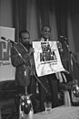 Quincy Jones and Harry Belafonte at a press conference (left); USA For Africa supergroup, featuring all musicians in a promotional photo (right)