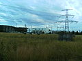 Switchyard of former GKK Etzenricht. On the right the pylon by which the powerline to Czech runs, left from this the valve hall, on the left the only remaining AC filter