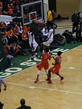 Nunn dunks an alley-oop pass from Jaylon Tate.