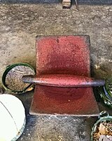 Mealy bugs being ground into traditional red dye in Oaxaca, Mexico.