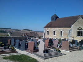 The commune's cemetery overlooking the village and its surrounding fields