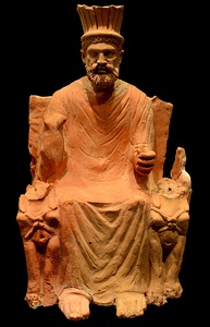 El dios Baal Hammón representado como un hombre anciano en un trono entre dos esfinges.