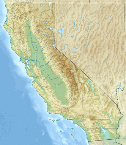 A topographic map of California with the UC campuses marked