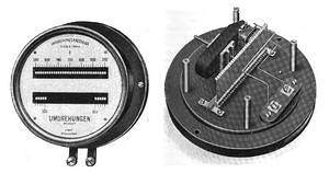 A resonant-reed frequency meter, an obsolete device used from about 1900 to the 1940s for measuring the frequency of alternating current.  It consists of a strip of metal with reeds of graduated lengths, vibrated by an electromagnet.  When the unknown frequency is applied to the electromagnet, the reed which is resonant at that frequency will vibrate with large amplitude, visible next to the scale.