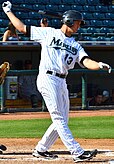 Kyle Skipworth (left) in the 2003–2011 home uniform; Chris Coghlan (2nd from left) in the 2003–2009 road uniform; Giancarlo Stanton (2nd from right) in the 2010–2011 road uniform; Dan Uggla (right) in the 2003–2011 black alternate uniform.