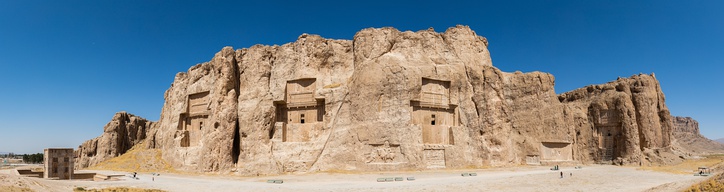  Panorama of Naqsh-e Rustam. Achaemenid tombs above, Sassanian reliefs below. The tombs, from left to right, probably belong to: Darius II, Artaxerxes I, Darius I, Xerxes I