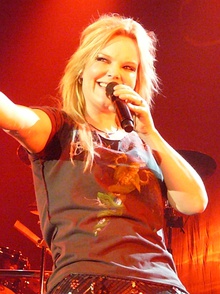 Olzon performing with Nightwish in 2009 at Mantova, Italy.