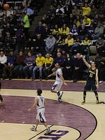 Stauskas in action in the 2012–13 Big Ten Conference men's basketball season opener on January 3 against Northwestern: left—slashing, left center—a layup, right center—follow through on a three-point field goal, right— a jump shot