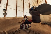 Rocket mass heater in a tipi at Paul Wheaton's permaculture homestead in Montana