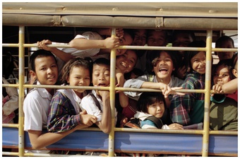 A songthaew loaded with students heading home in Amphoe Kantharalak