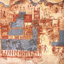 Ancient wall painting showing buildings and people