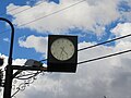 R.S.L. clock, Jandowea, Queensland, Australia. Numbers on the clock face are replaced by the words "Lest we forget".