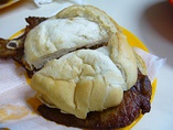 (Left): Macanese-style pastel de nata. (Right): Pork chop buns are popular street snacks.