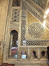 Ottoman-era minbar of the Selimiye Mosque in Edirne (circa 1574). This marble minbar is pierced with geometric openwork and has a typical Ottoman conical cap.