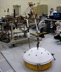 A test of the 2.4 meter long Instrument Deployment Arm, seen deploying SEIS