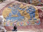 The Tsongkhapa and other deities painted on rock on the approach to hermitage