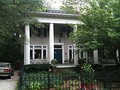 Four-Square with Greek Revival columns added in 1970s (before historic zoning)